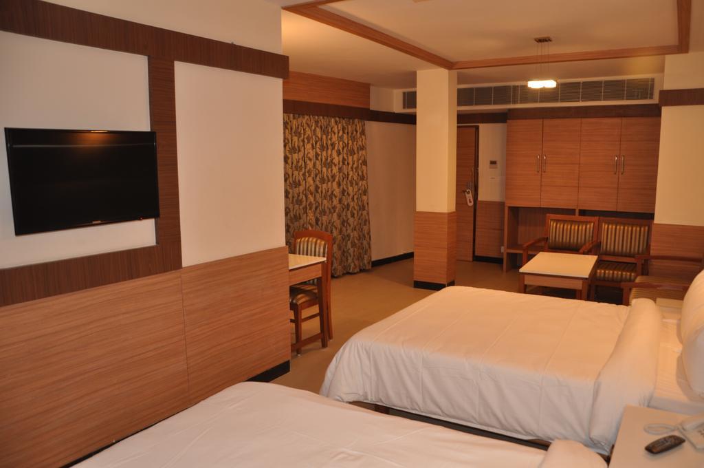 Hotel SMS Grand Inn Vellore Zimmer foto